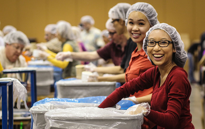 volunteers packing FMSC meals