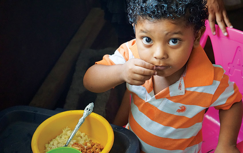 child eating FMSC food