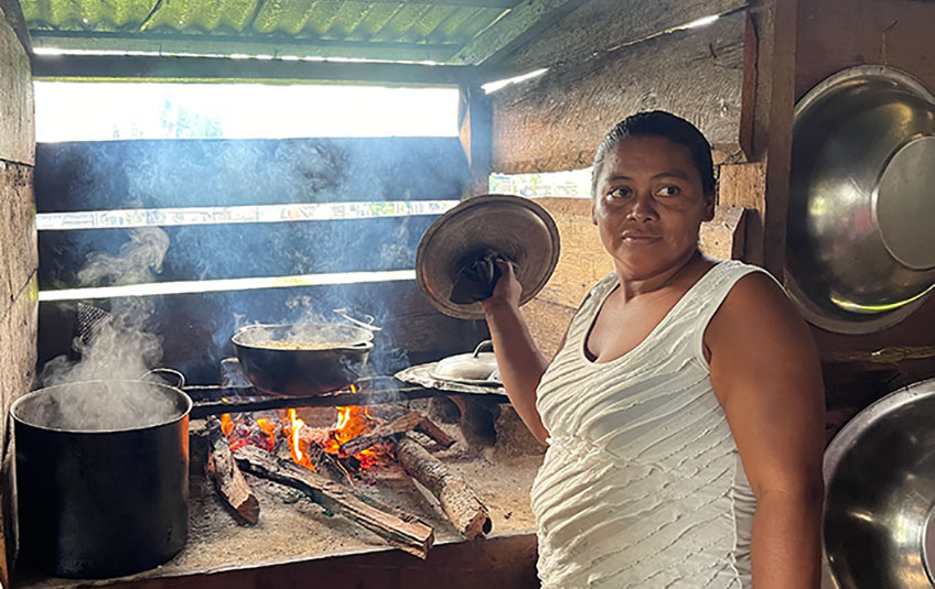 a woman cooking MannaPack rice