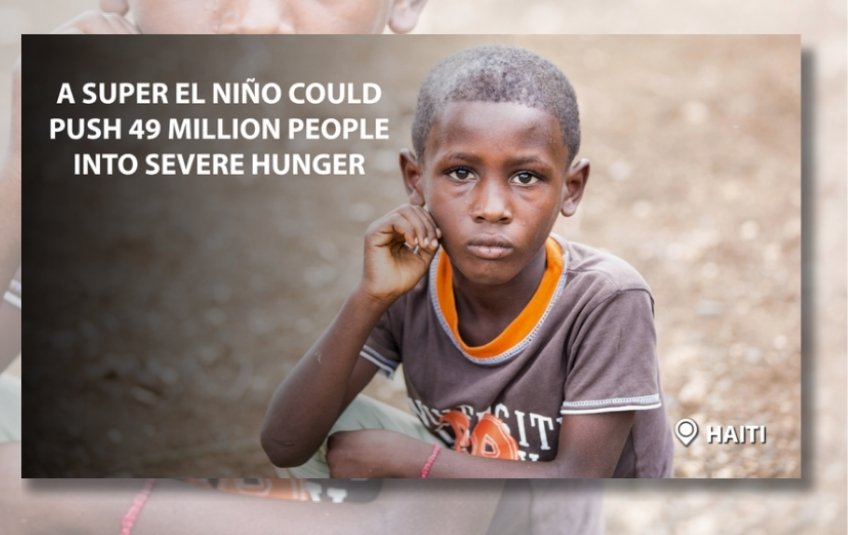 Haitian boy, WFP, a super el nino could push 49 million people into severe hunger